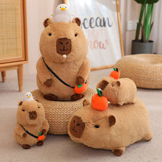 Peluche capybara, capybara sentado y capybara tumbado