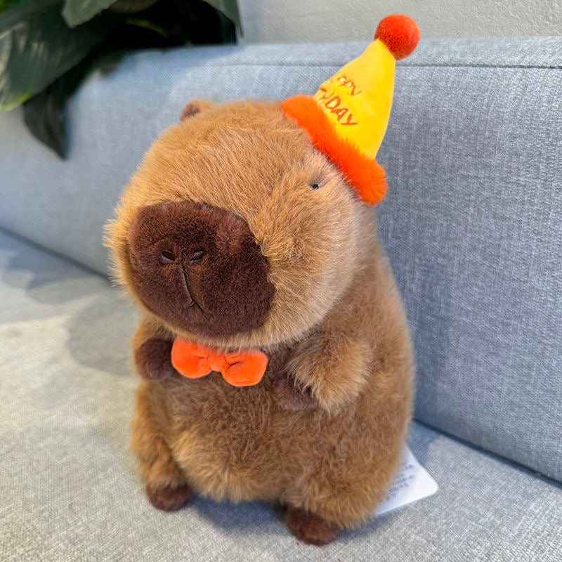 Capybara con sombrero de feliz cumpleaños