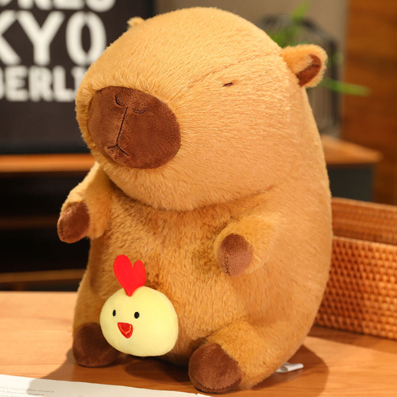 Peluche de capibara con pollo