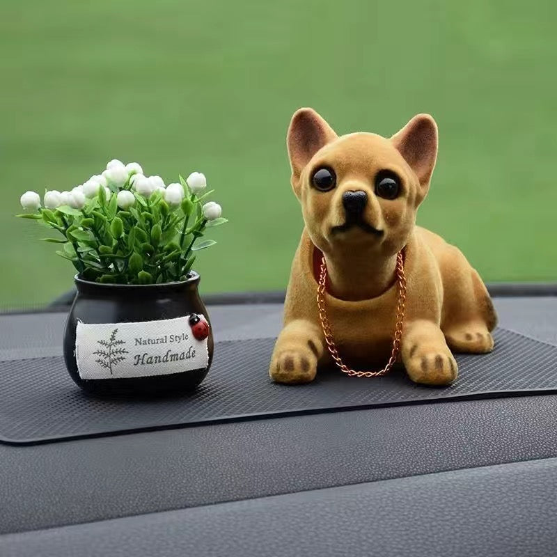 Muñeca perro para coche
