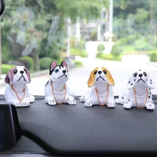 Muñeca perro para coche