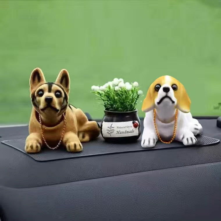 Muñeca perro para coche