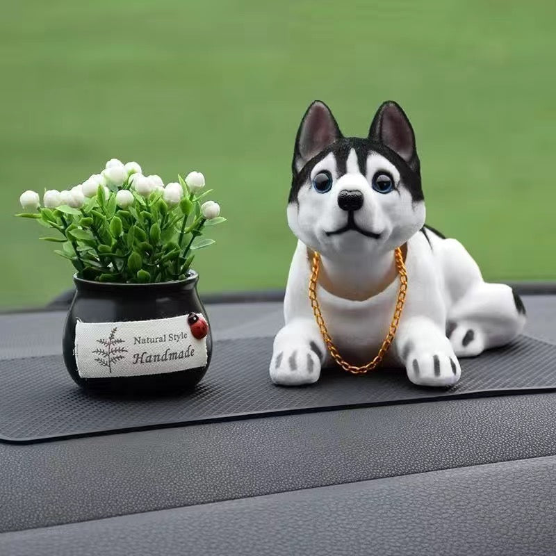 Muñeca perro para coche