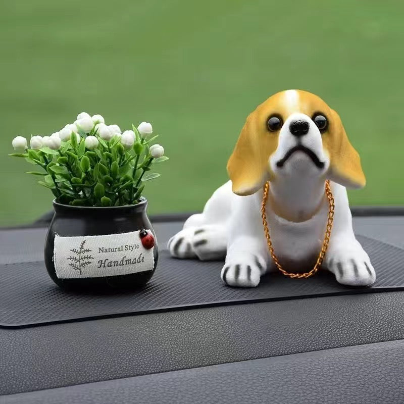 Muñeca perro para coche