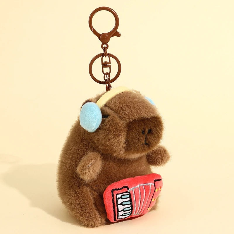 Peluche colgante de Capibara musical