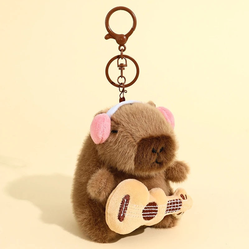 Peluche colgante de Capibara musical