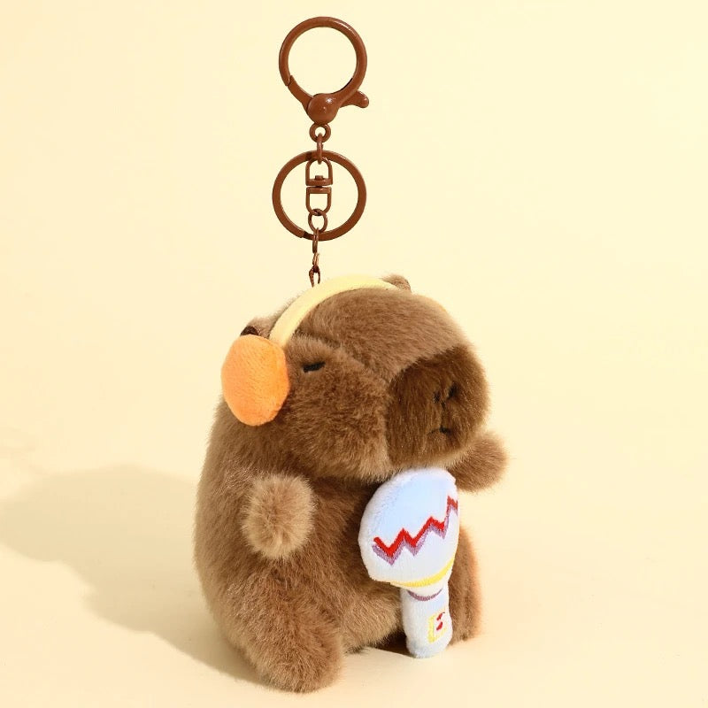 Peluche colgante de Capibara musical