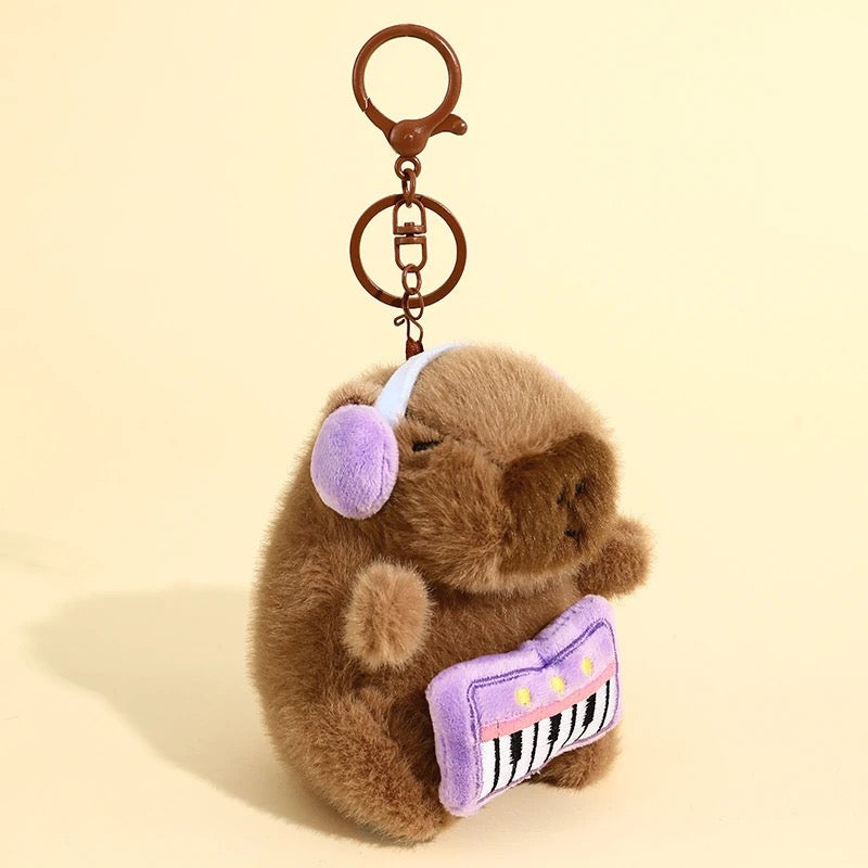 Peluche colgante de Capibara musical