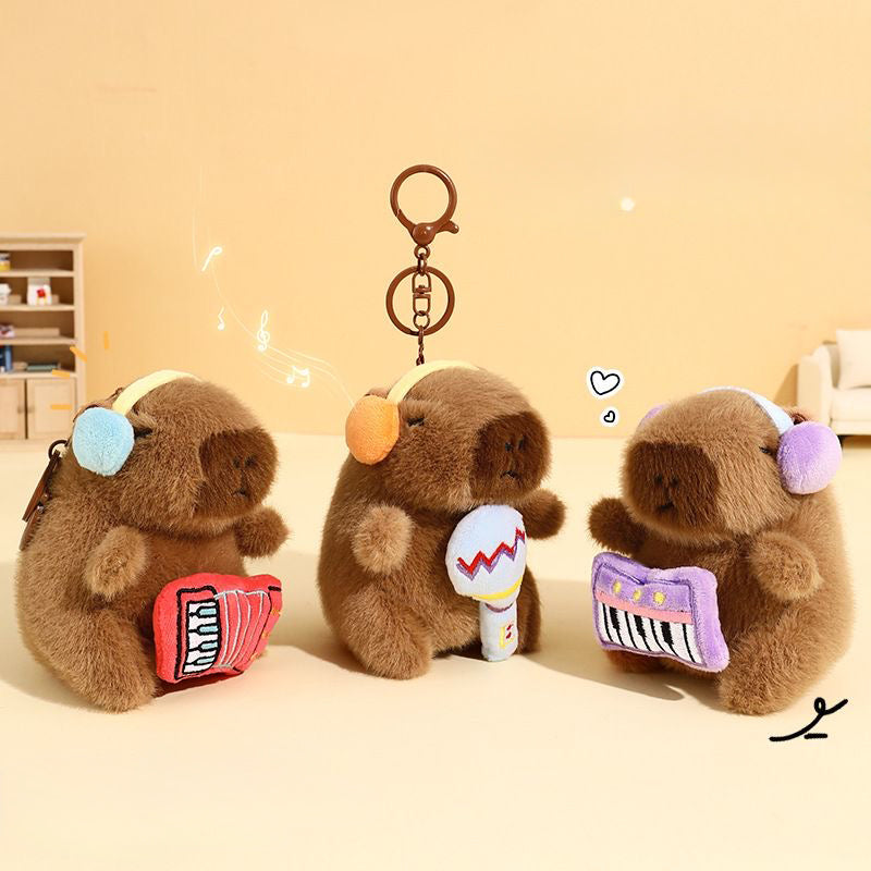 Peluche colgante de Capibara musical
