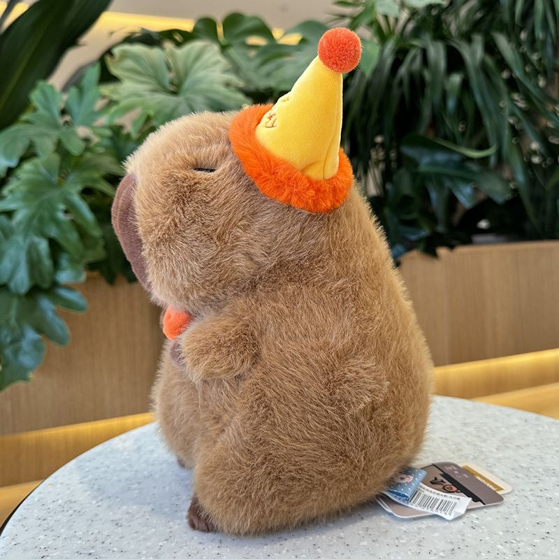 Capybara con sombrero de feliz cumpleaños