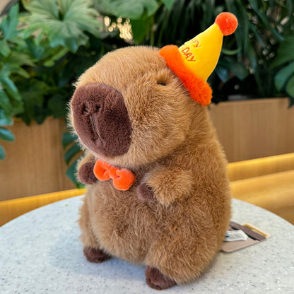 Capybara con sombrero de feliz cumpleaños