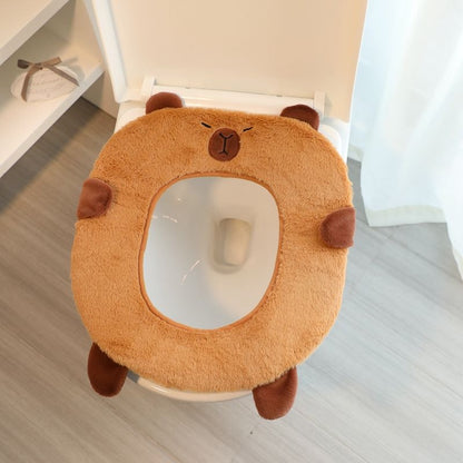 Asiento capybara del baño