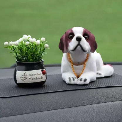 Muñeca perro para coche