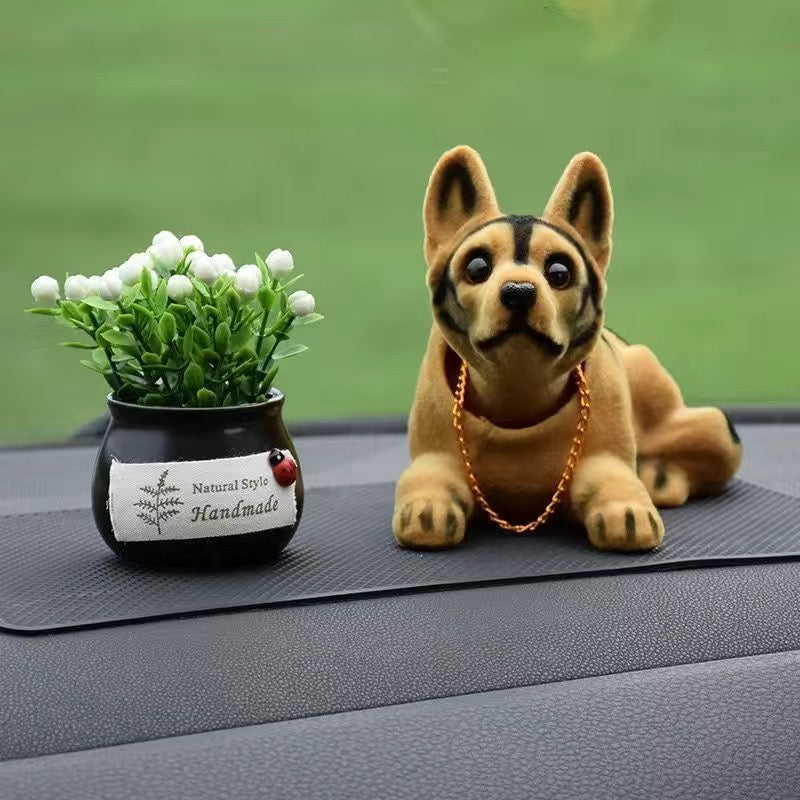 Muñeca perro para coche