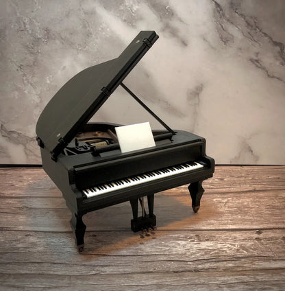 caja de música de piano figuras 3D