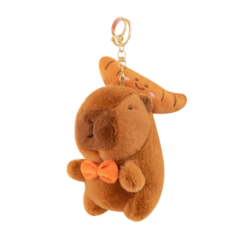 Peluches de capibara y croissant