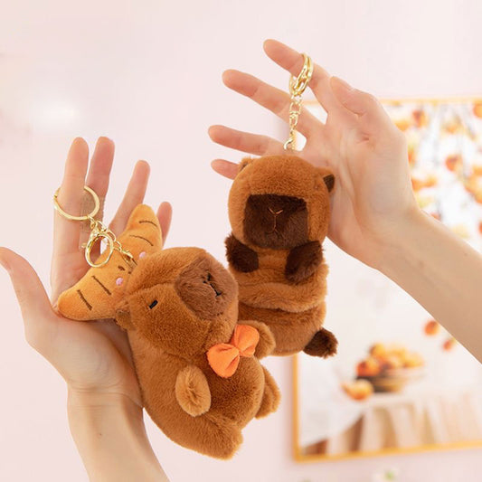 Peluches de capibara y croissant