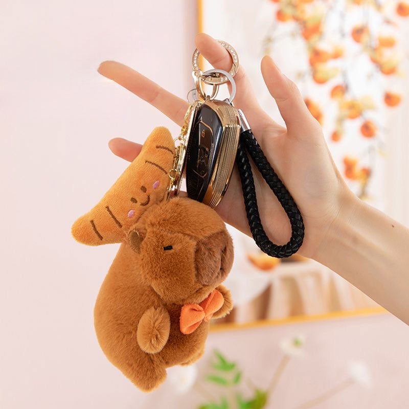 Peluches de capibara y croissant