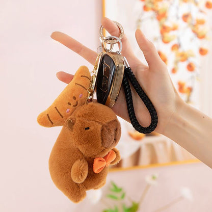Peluches de capibara y croissant