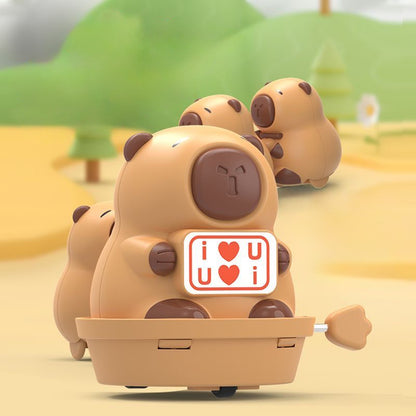Juguete de cuerda con capibara que se balancea